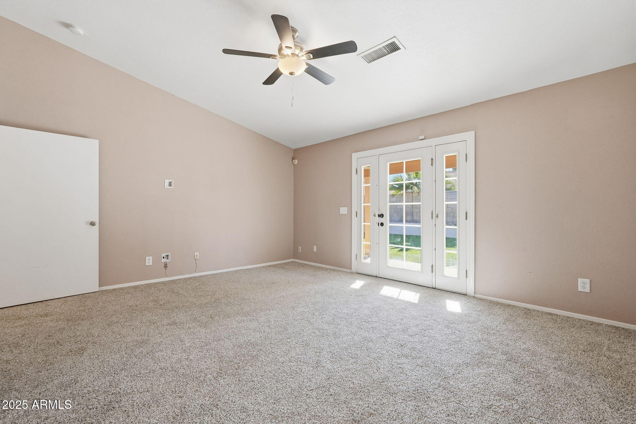 1619 East Carter Road Phoenix, AZ 85042 - Photo 35 of 56 a view of an empty room with a window