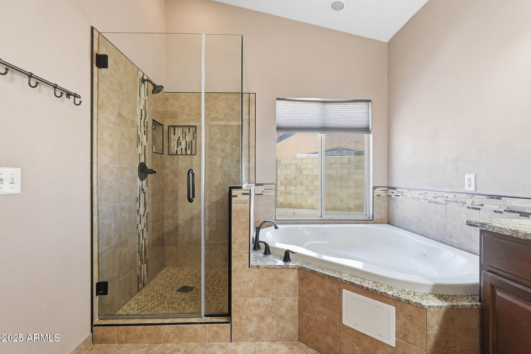 1619 East Carter Road Phoenix, AZ 85042 - Photo 41 of 56 a bathroom with a granite countertop tub shower and mirror