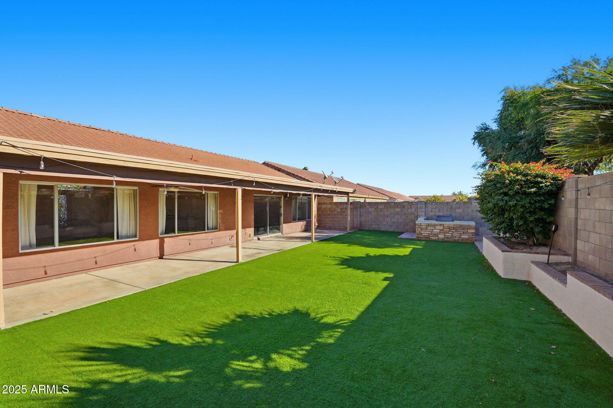 1619 East Carter Road Phoenix, AZ 85042 - Photo 56 of 56 a view of a house with a backyard