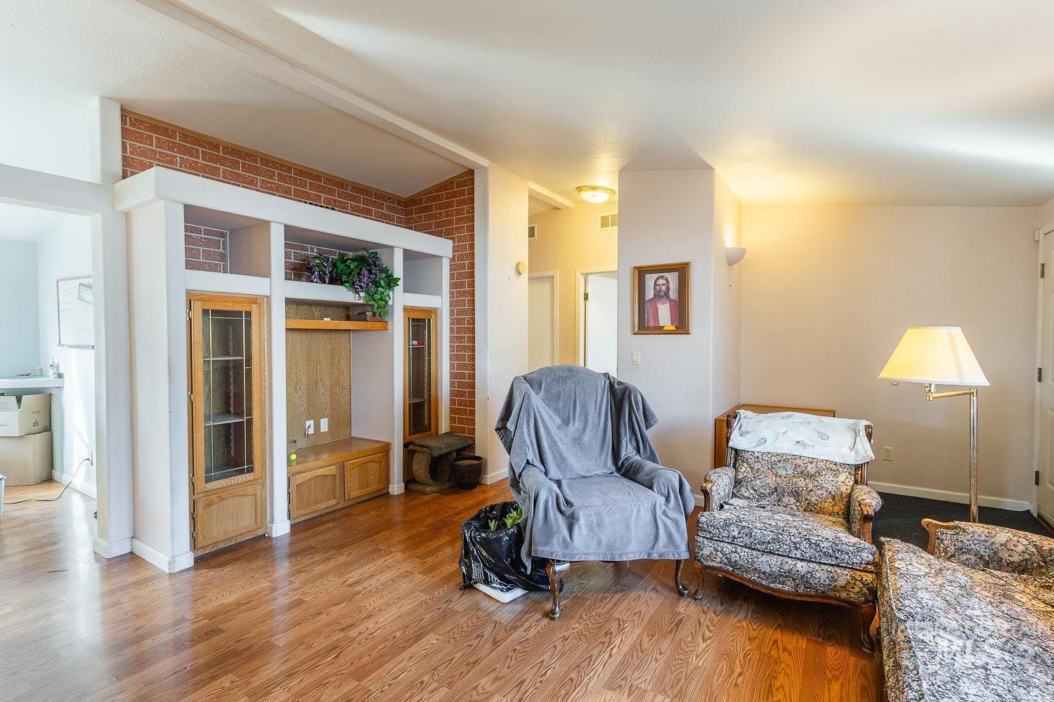 4119 Ashton Avenue Caldwell, ID 83607 - Photo 11 of 50 Living area with light wood-type flooring and baseboards