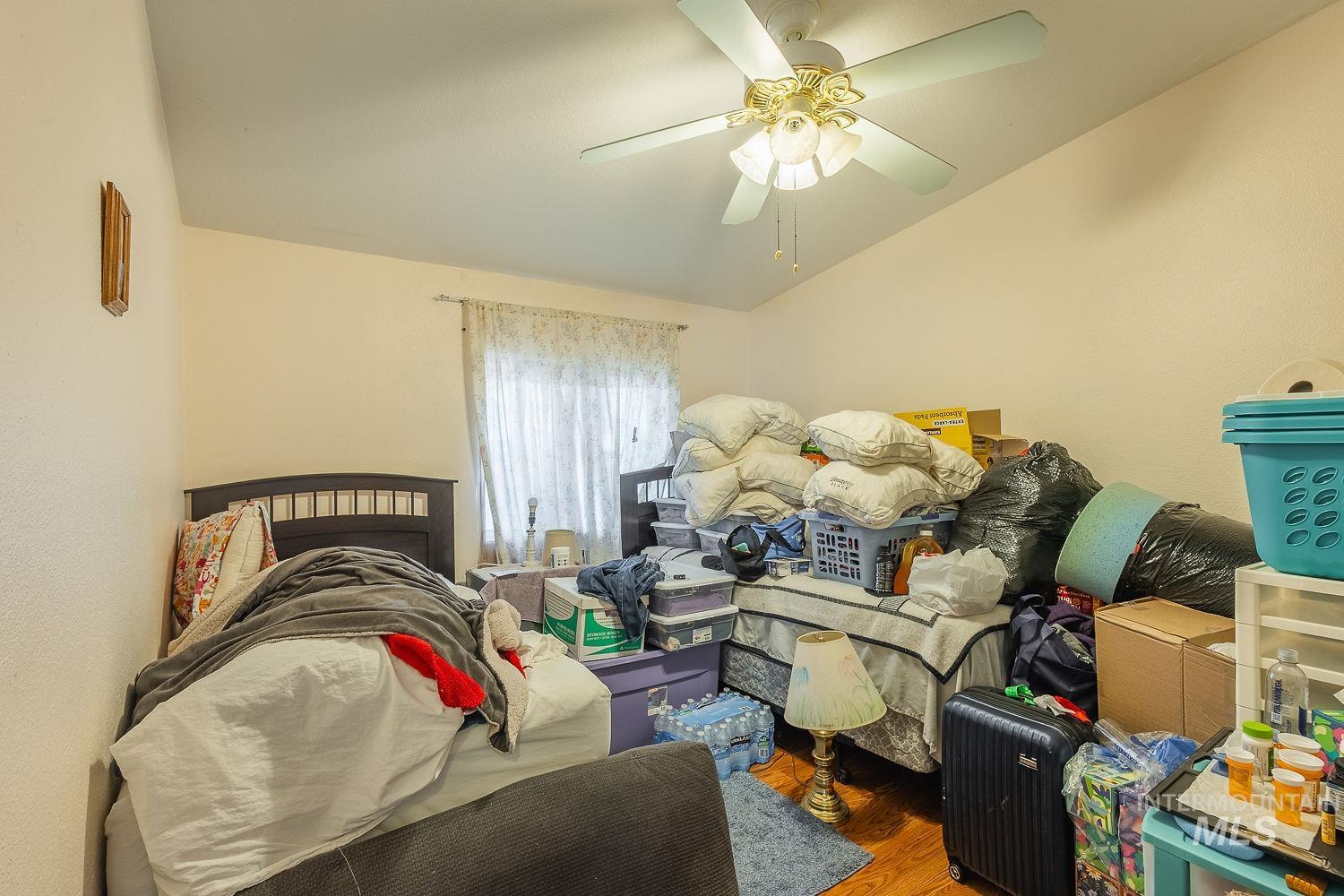 4119 Ashton Avenue Caldwell, ID 83607 - Photo 38 of 50 Bedroom with wood finished floors and ceiling fan