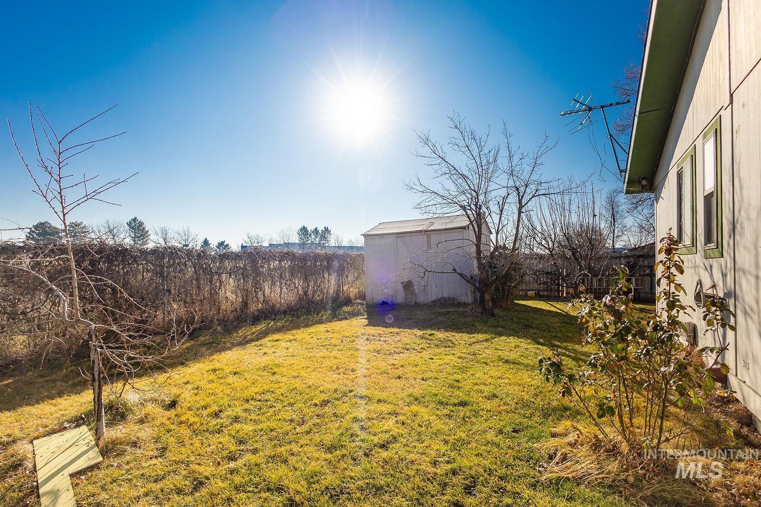 4119 Ashton Avenue Caldwell, ID 83607 - Photo 45 of 50 Fenced backyard with a shed