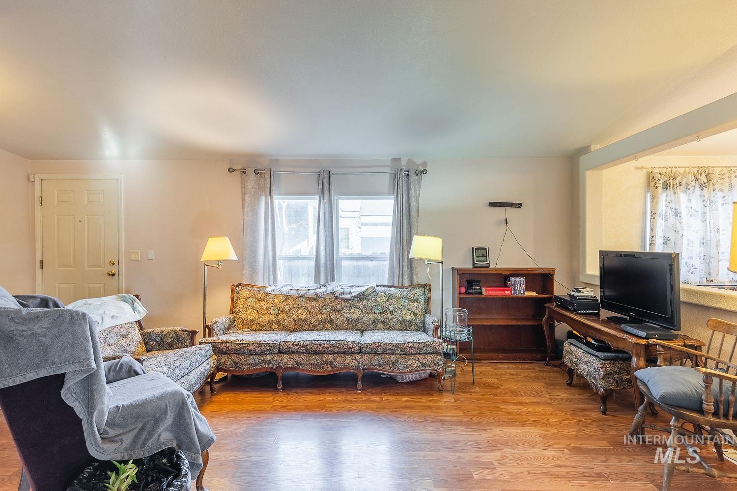 4119 Ashton Avenue Caldwell, ID 83607 - Photo 8 of 50 Living room with wood finished floors