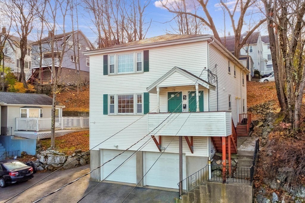 a front view of a house with porch