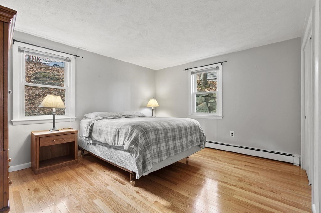 6 Dundee Road, Unit 6 Arlington, MA 02476 - Photo 20 of 29 a bedroom with a bed and window