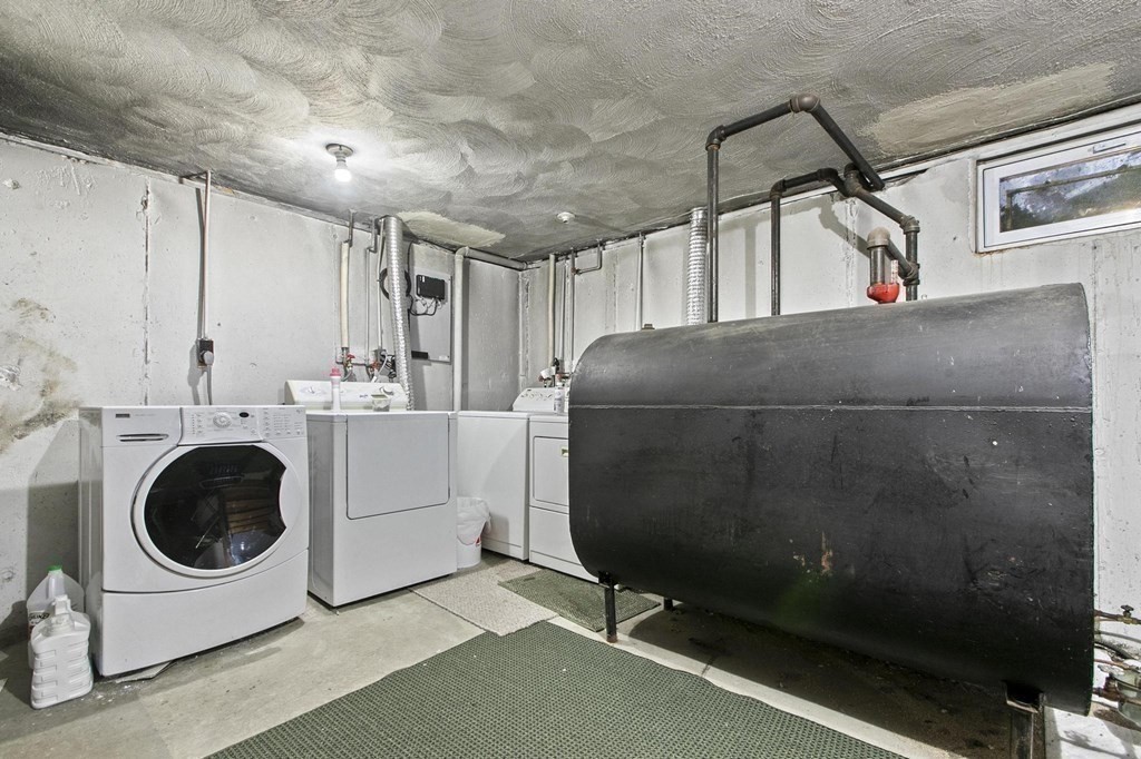 6 Dundee Road, Unit 6 Arlington, MA 02476 - Photo 23 of 29 a utility room with dryer and washer