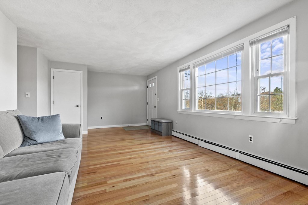 6 Dundee Road, Unit 6 Arlington, MA 02476 - Photo 10 of 29 a view of an empty room with a window