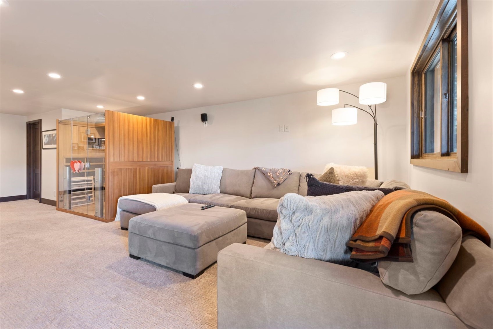 103 Bearing Tree Road Breckenridge, CO 80424 - Photo 22 of 30 a living room with furniture and a large mirror