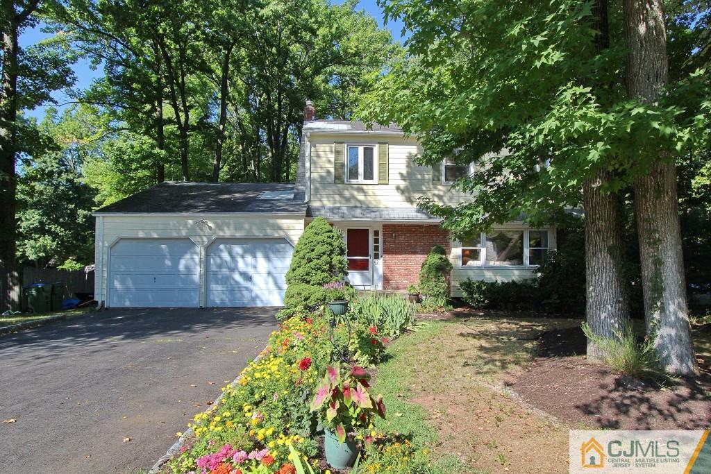 62 Harding Avenue Edison, NJ 08820 - Photo 2 of 24 a front view of a house with a yard