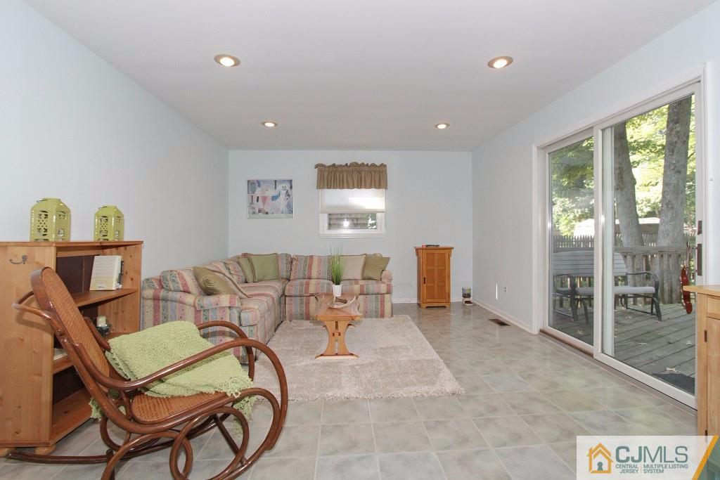 62 Harding Avenue Edison, NJ 08820 - Photo 11 of 24 a living room with furniture and window
