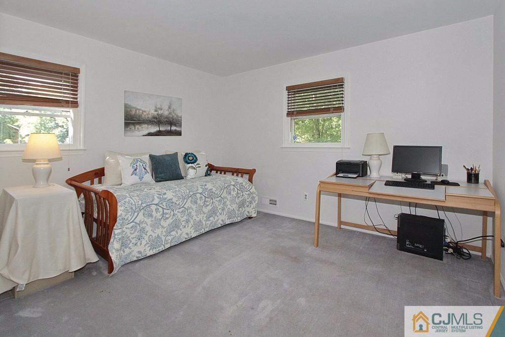 62 Harding Avenue Edison, NJ 08820 - Photo 18 of 24 a living room with furniture and a window
