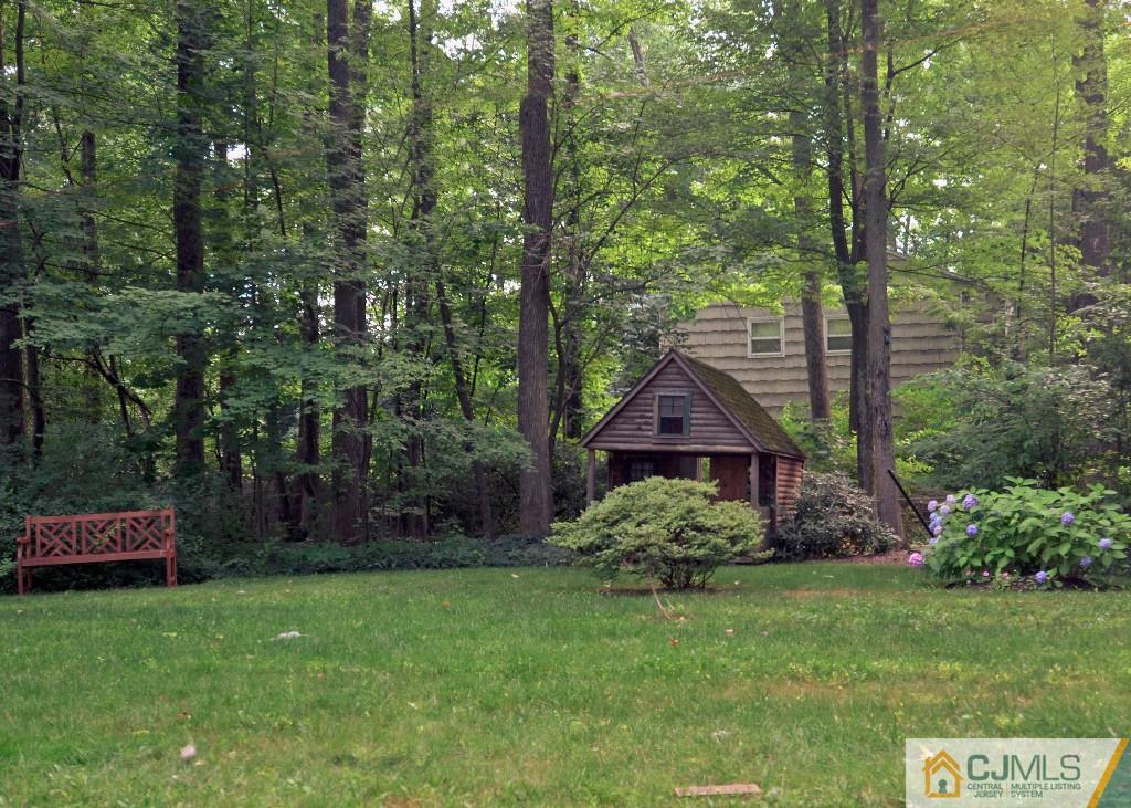 62 Harding Avenue Edison, NJ 08820 - Photo 23 of 24 a front view of a house with garden