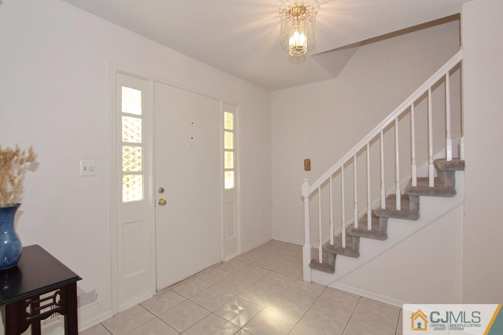 62 Harding Avenue Edison, NJ 08820 - Photo 4 of 24 a view of entryway with stairs