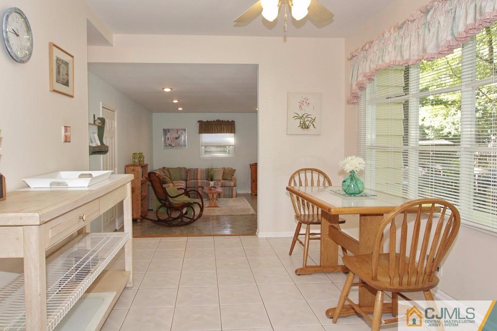62 Harding Avenue Edison, NJ 08820 - Photo 10 of 24 a living room with furniture and a large window