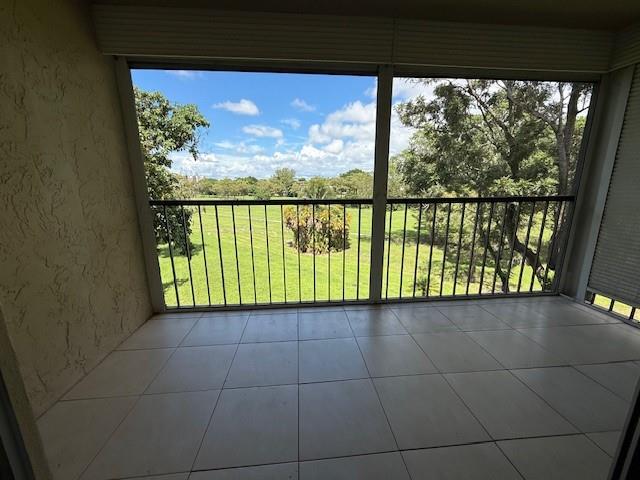 a view of a room with a large window