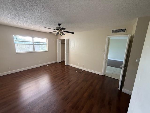 6101 North Falls Cir Drive, Unit 402 Lauderhill, FL 33319 - Photo 11 of 20 wooden floor in an empty room with a window