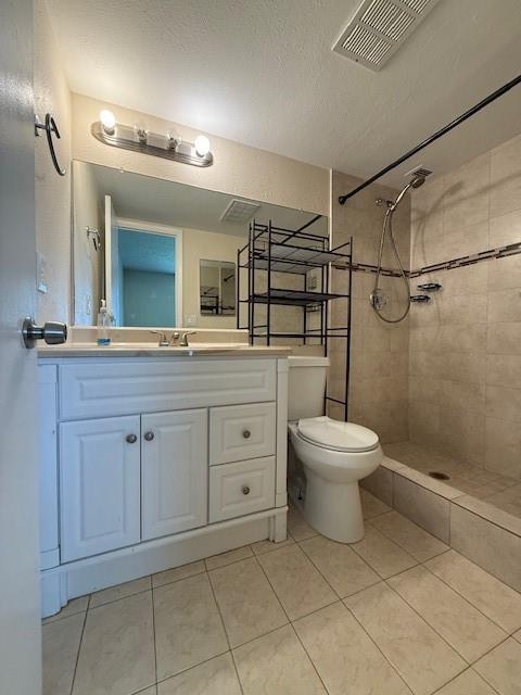 6101 North Falls Cir Drive, Unit 402 Lauderhill, FL 33319 - Photo 14 of 20 a bathroom with a toilet sink and mirror