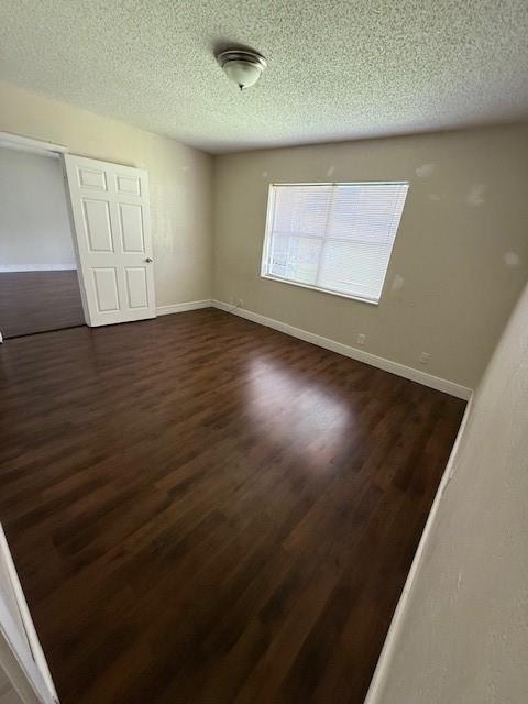6101 North Falls Cir Drive, Unit 402 Lauderhill, FL 33319 - Photo 17 of 20 an empty room with wooden floor and windows