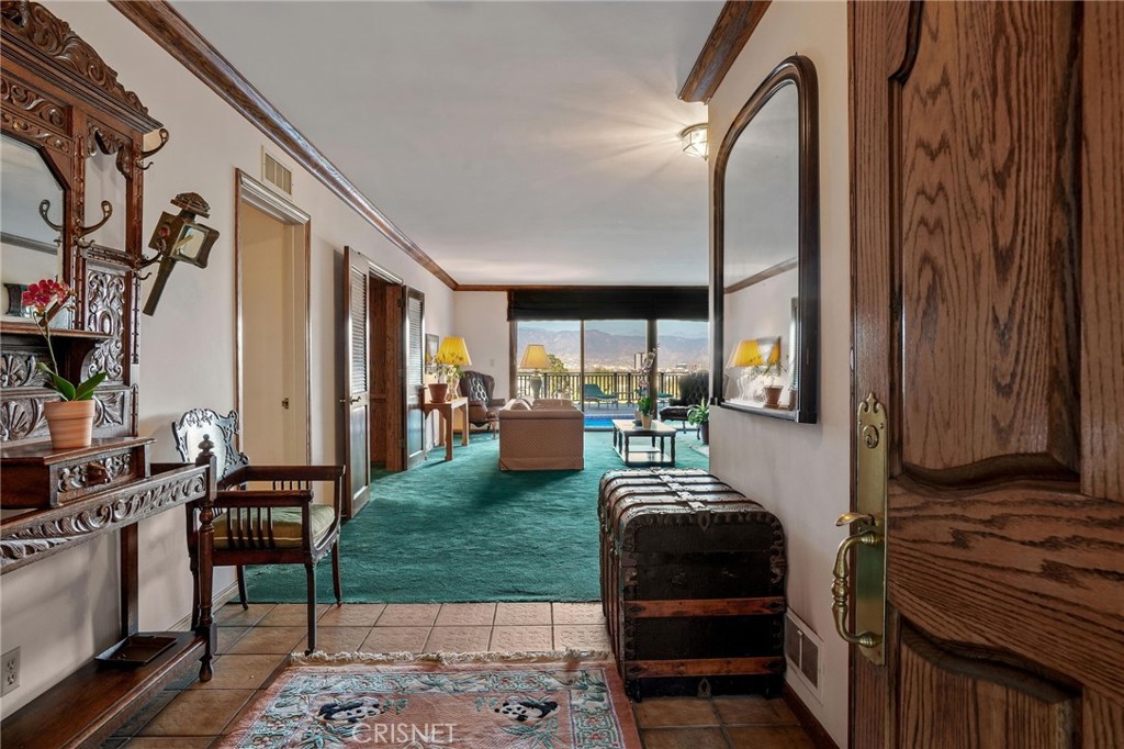 3620 Wrightwood Drive Studio City, CA 91604 - Photo 11 of 39 a living room with furniture and a fireplace