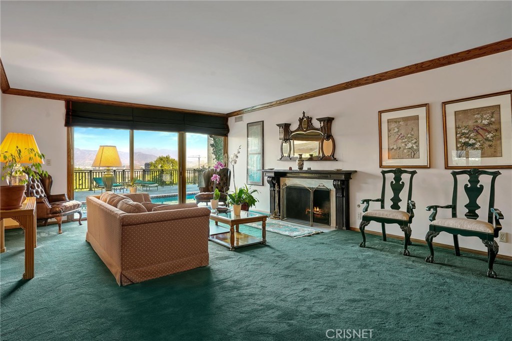 3620 Wrightwood Drive Studio City, CA 91604 - Photo 14 of 39 a living room with furniture and a fireplace