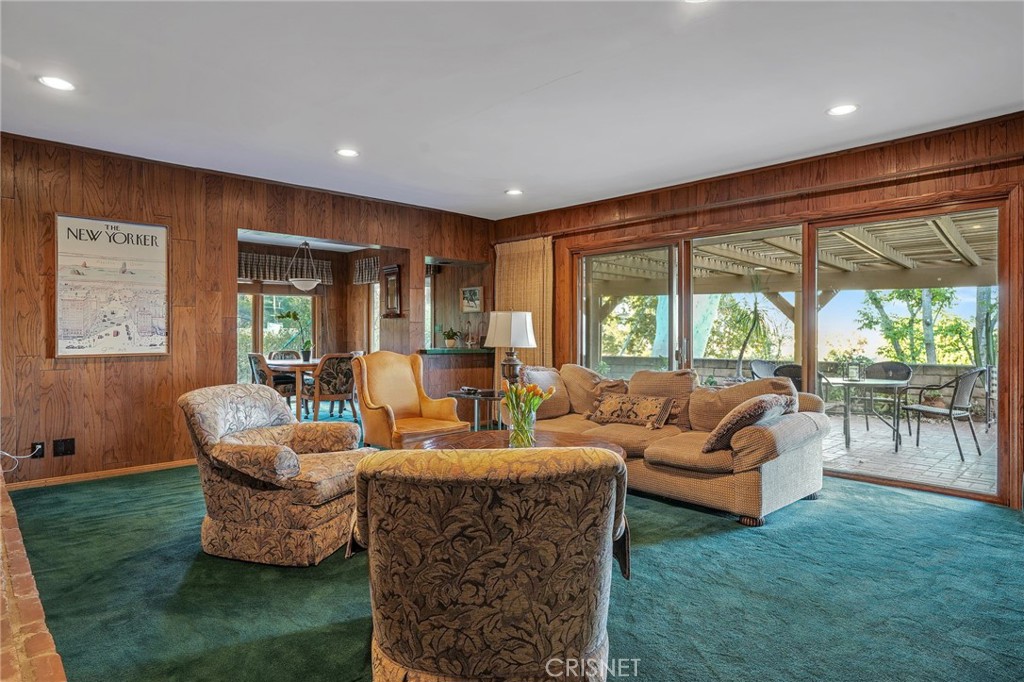 3620 Wrightwood Drive Studio City, CA 91604 - Photo 16 of 39 a living room with fireplace furniture and a large window