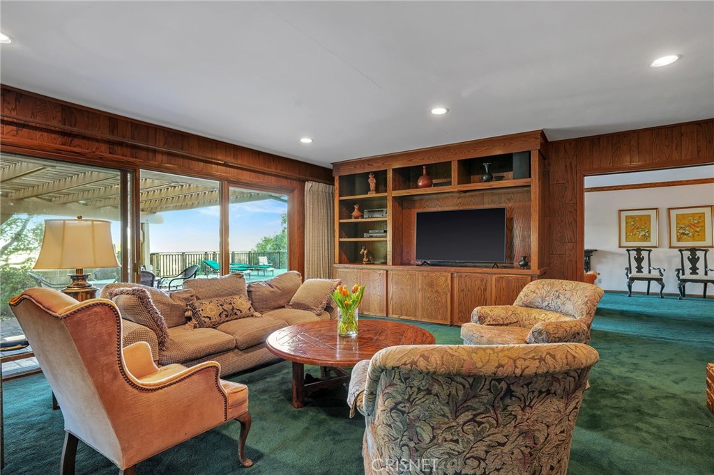 3620 Wrightwood Drive Studio City, CA 91604 - Photo 17 of 39 a living room with furniture and a floor to ceiling window