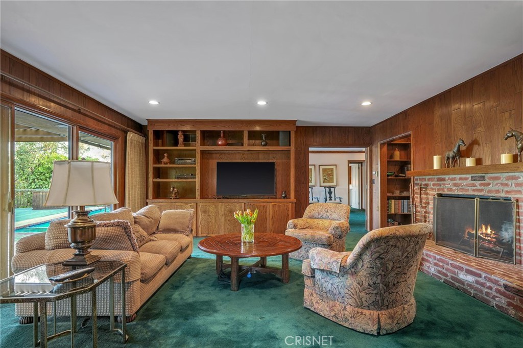 3620 Wrightwood Drive Studio City, CA 91604 - Photo 18 of 39 a living room with furniture and a fireplace