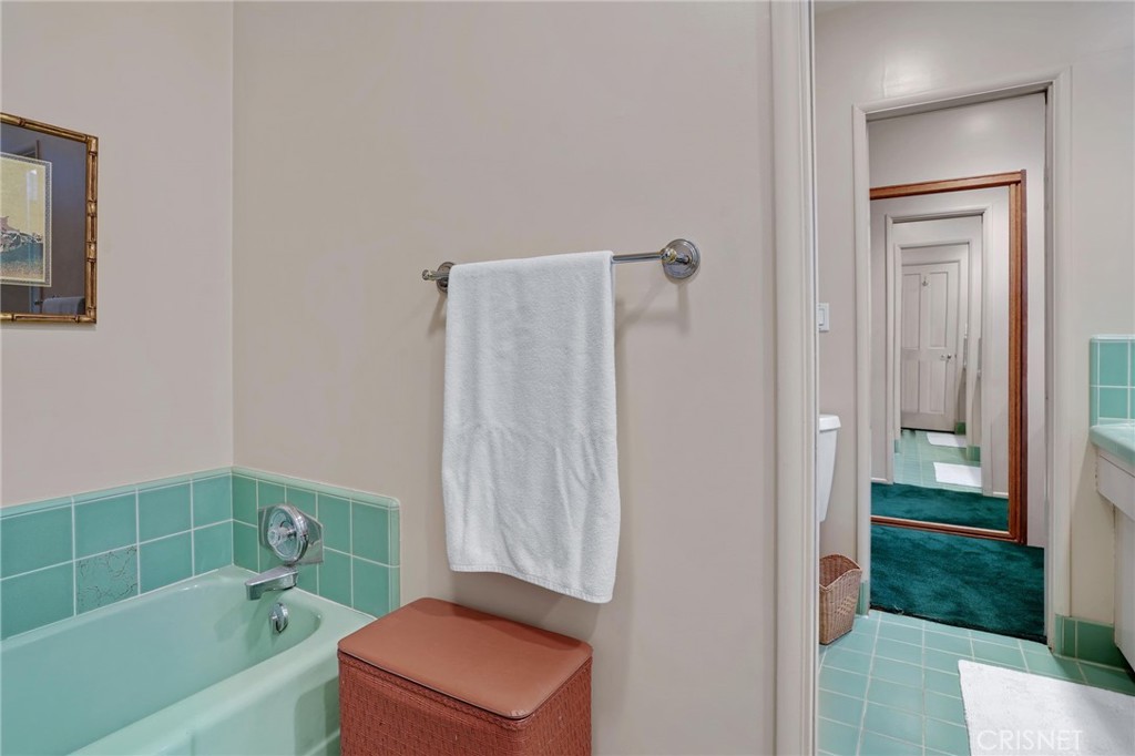 3620 Wrightwood Drive Studio City, CA 91604 - Photo 29 of 39 a bathroom with a shower and a bath tub