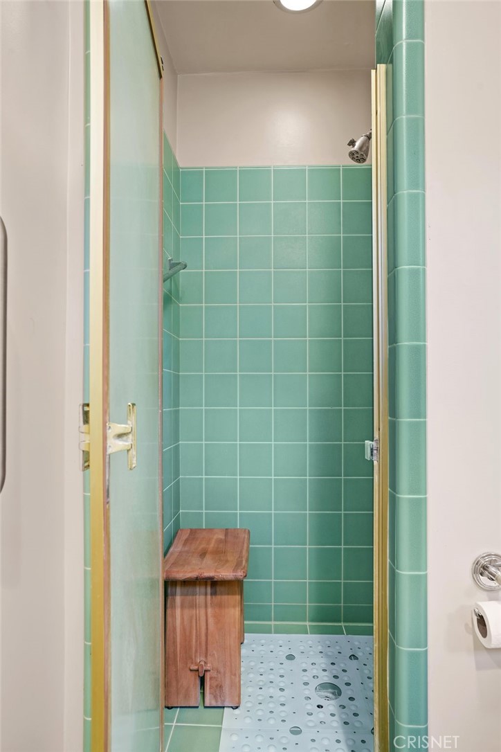 3620 Wrightwood Drive Studio City, CA 91604 - Photo 30 of 39 a bathroom with a shower and a sink