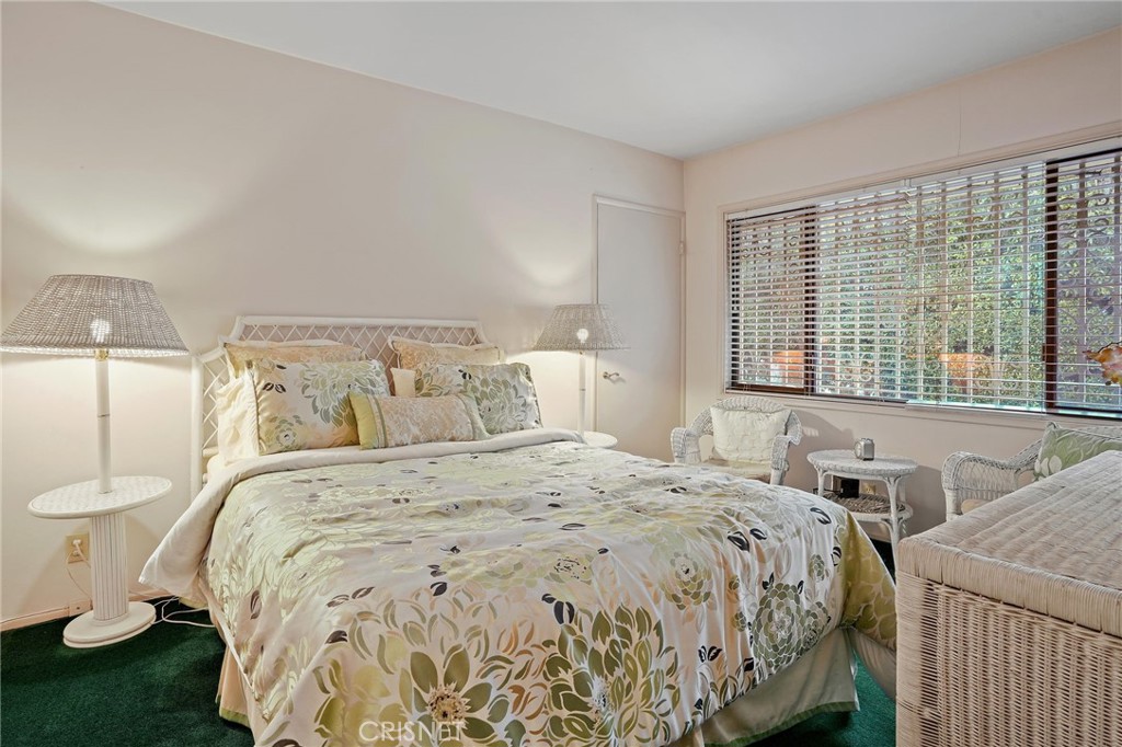 3620 Wrightwood Drive Studio City, CA 91604 - Photo 34 of 39 a bedroom with a bed and a window