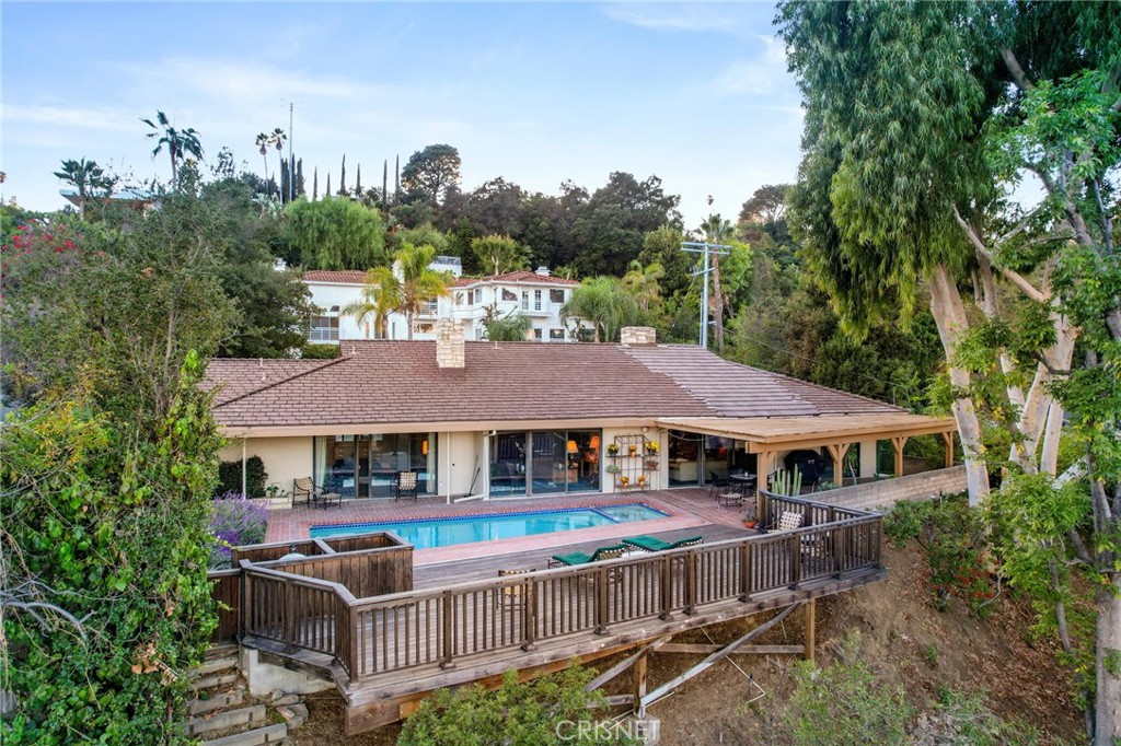 3620 Wrightwood Drive Studio City, CA 91604 - Photo 4 of 39 a house with lots of trees in the background