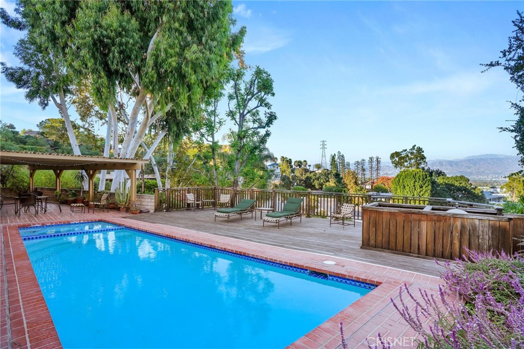 3620 Wrightwood Drive Studio City, CA 91604 - Photo 5 of 39 a view of a swimming pool with a patio and lake