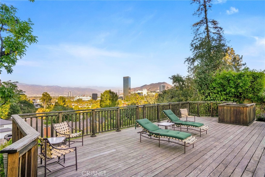 3620 Wrightwood Drive Studio City, CA 91604 - Photo 6 of 39 a view of a balcony with wooden floor and city view
