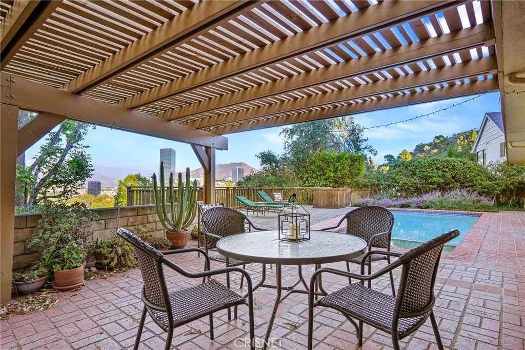 3620 Wrightwood Drive Studio City, CA 91604 - Photo 7 of 39 a view of a patio with a table and chairs