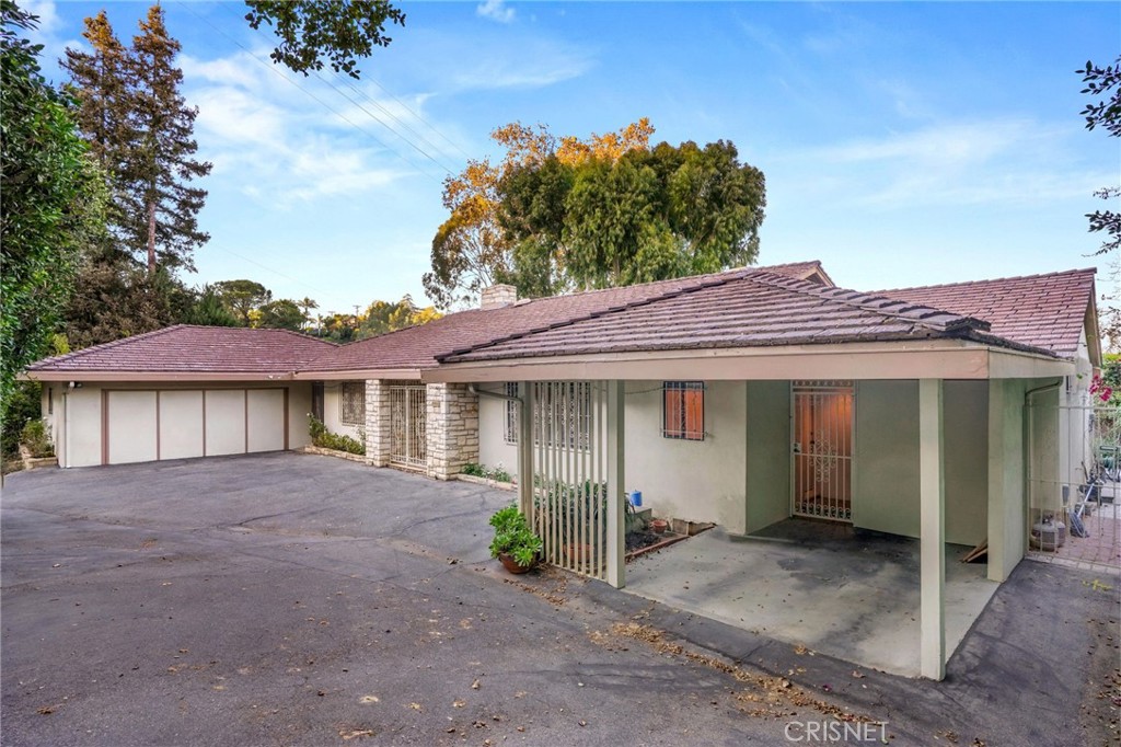 3620 Wrightwood Drive Studio City, CA 91604 - Photo 10 of 39 a view of a house with a yard and potted plants