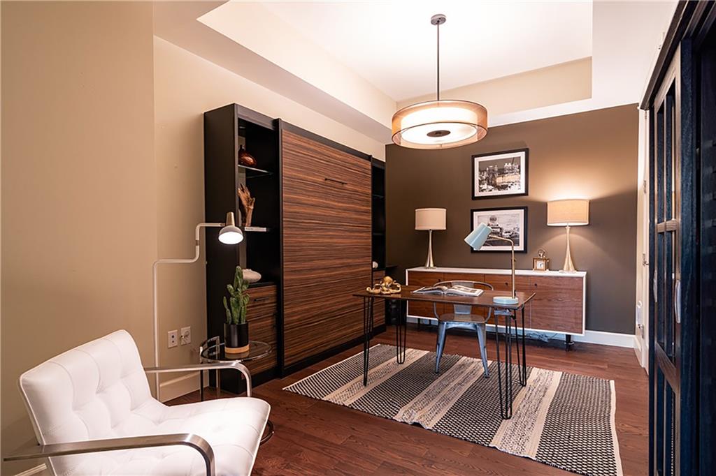 1820 Peachtree Road Northwest, Unit 1408 Atlanta, GA 30309 - Photo 17 of 37 a view of a livingroom with furniture and a couch