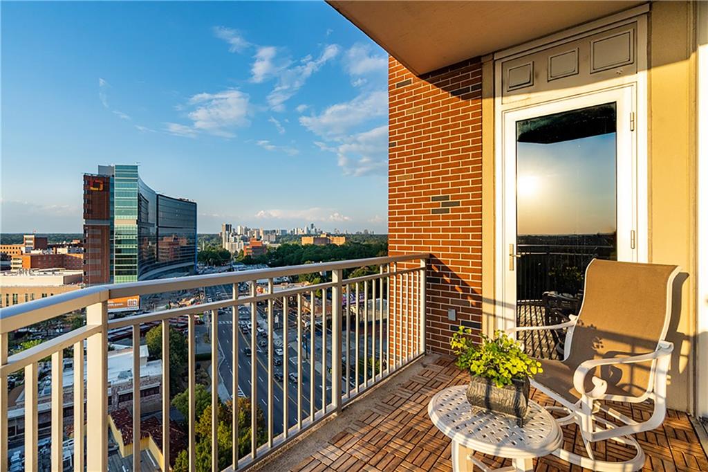 1820 Peachtree Road Northwest, Unit 1408 Atlanta, GA 30309 - Photo 19 of 37 a balcony view with a potted plant