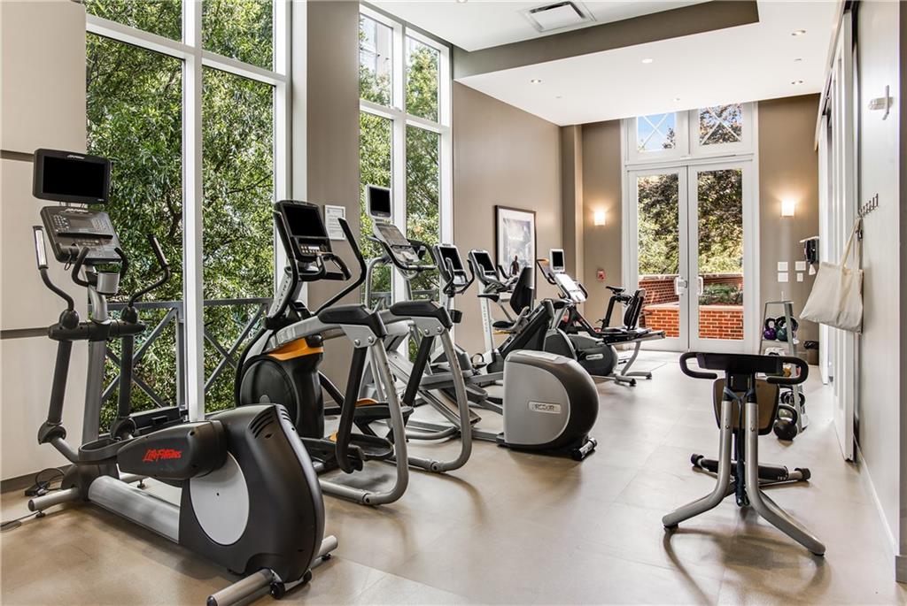 1820 Peachtree Road Northwest, Unit 1408 Atlanta, GA 30309 - Photo 26 of 37 a view of a room with gym equipment
