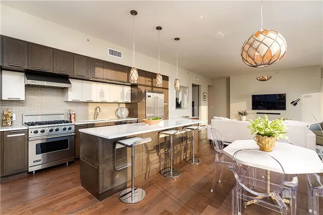 a kitchen with a stove and a table