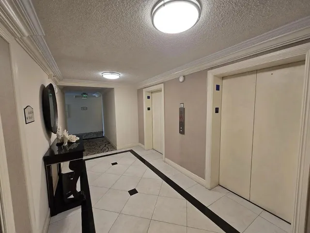 a room with a mirror and a window