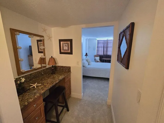 a view of a livingroom with furniture and window