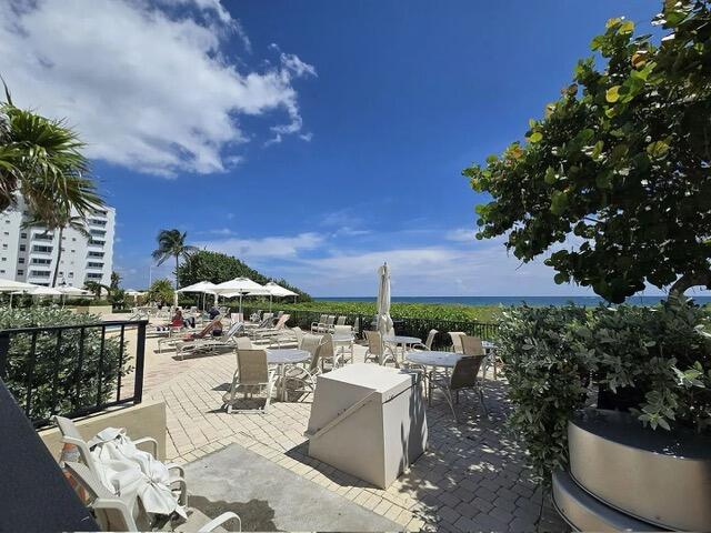 1900 South Ocean Boulevard, Unit 11L Lauderdale-by-the-Sea, FL 33062 - Photo 10 of 16 a view of a patio with furniture and a potted plants
