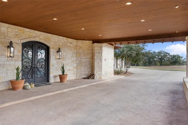 a view of a building with porch and outdoor seating