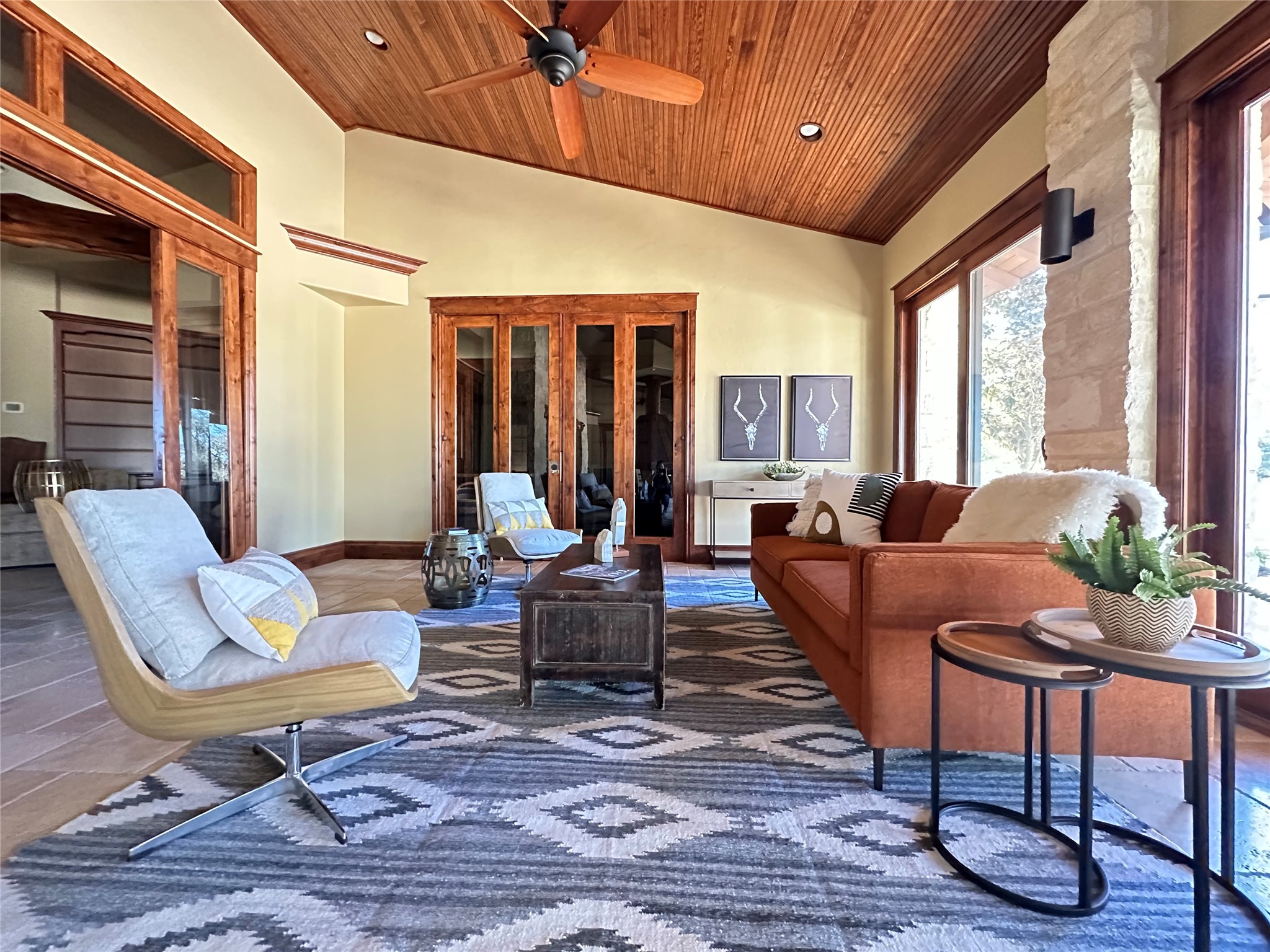 170 Goose Landing, Unit 10 57ACRES Harper, TX 78631 - Photo 12 of 40 a living room with patio furniture and a large window