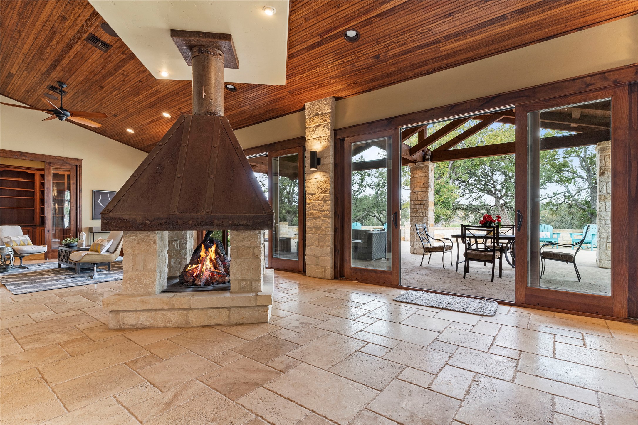 170 Goose Landing, Unit 10 57ACRES Harper, TX 78631 - Photo 14 of 40 a view of a chairs and table in a patio
