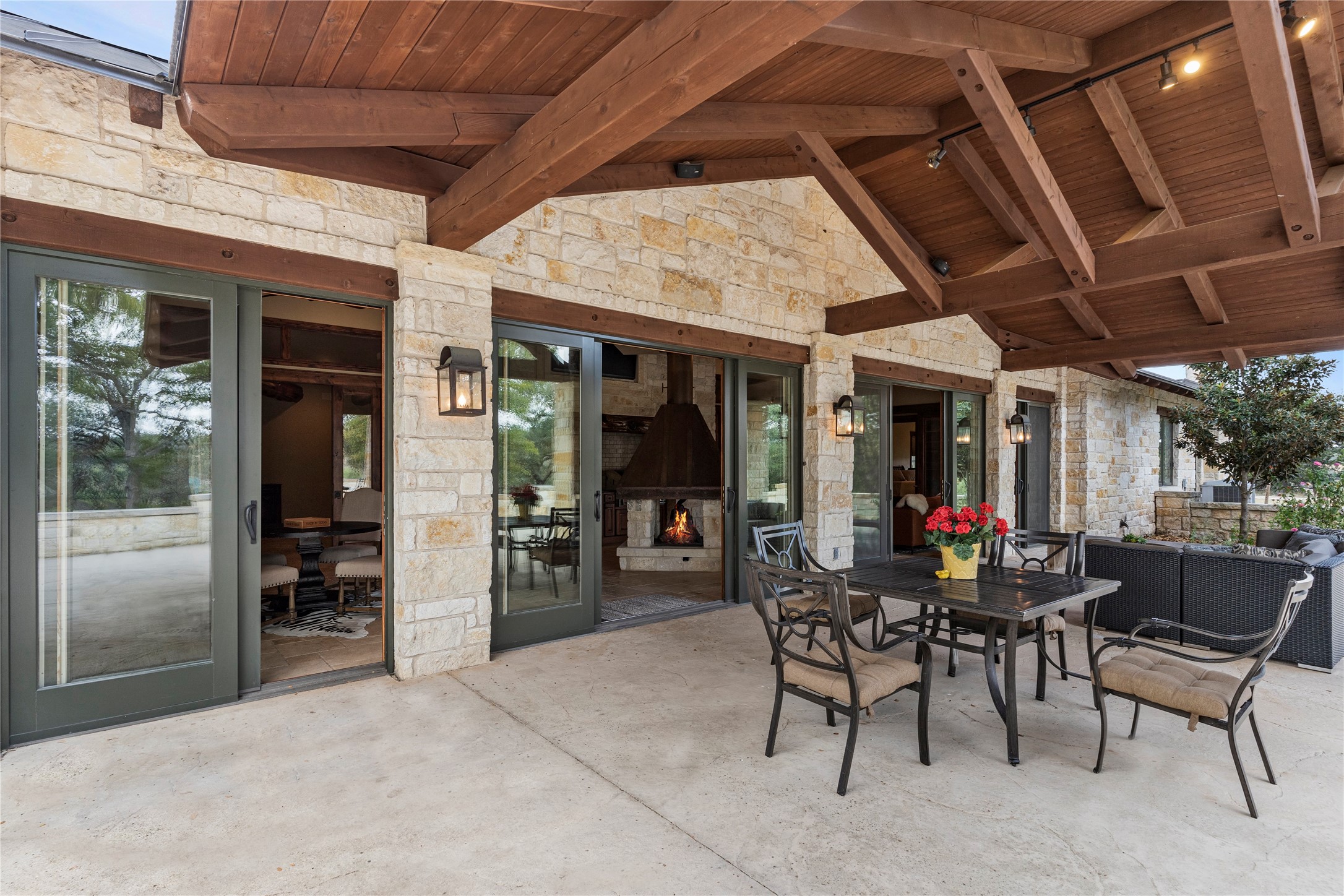 170 Goose Landing, Unit 10 57ACRES Harper, TX 78631 - Photo 17 of 40 a view of a dinning room and chairs in patio