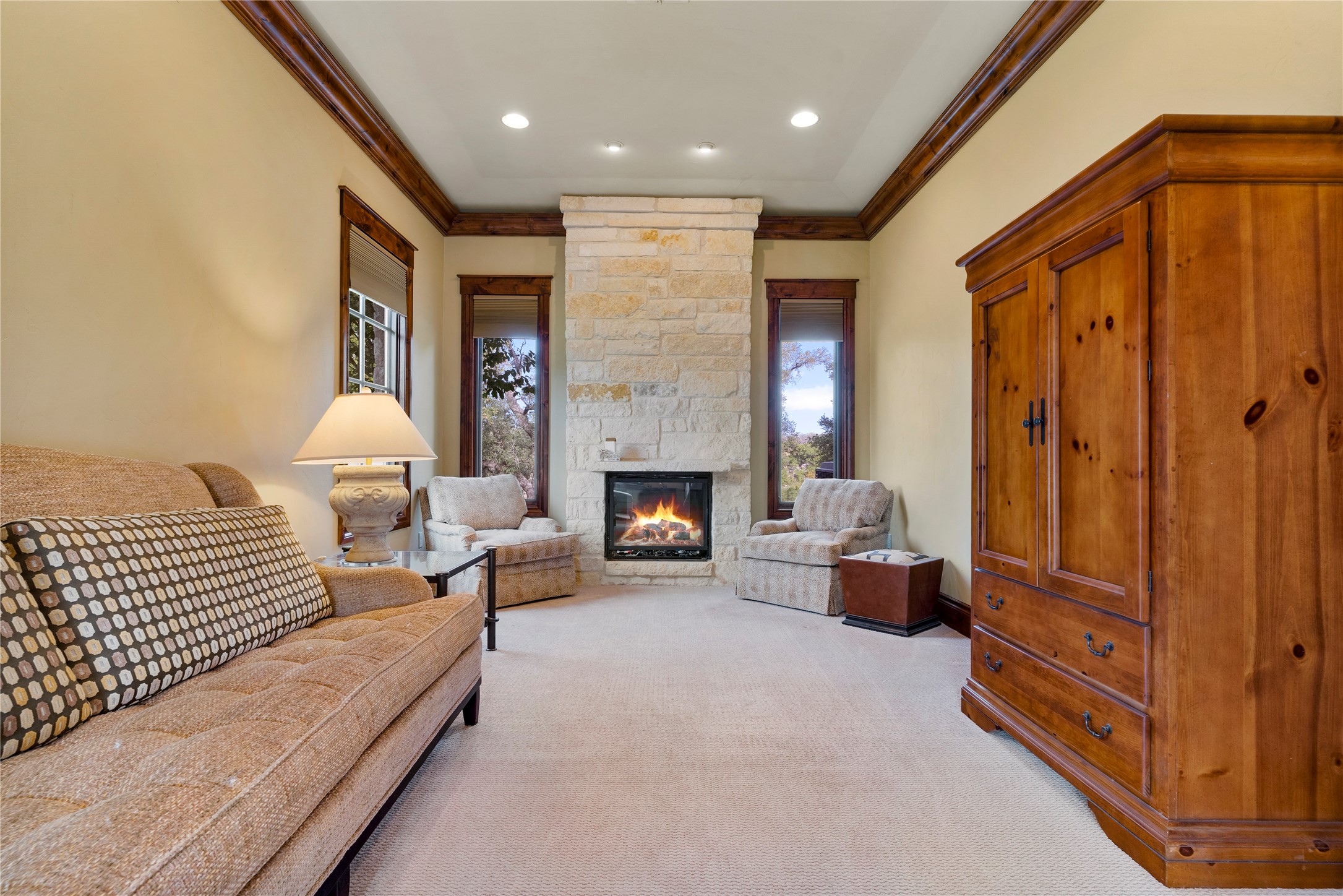 170 Goose Landing, Unit 10 57ACRES Harper, TX 78631 - Photo 25 of 40 a living room with furniture and a fireplace