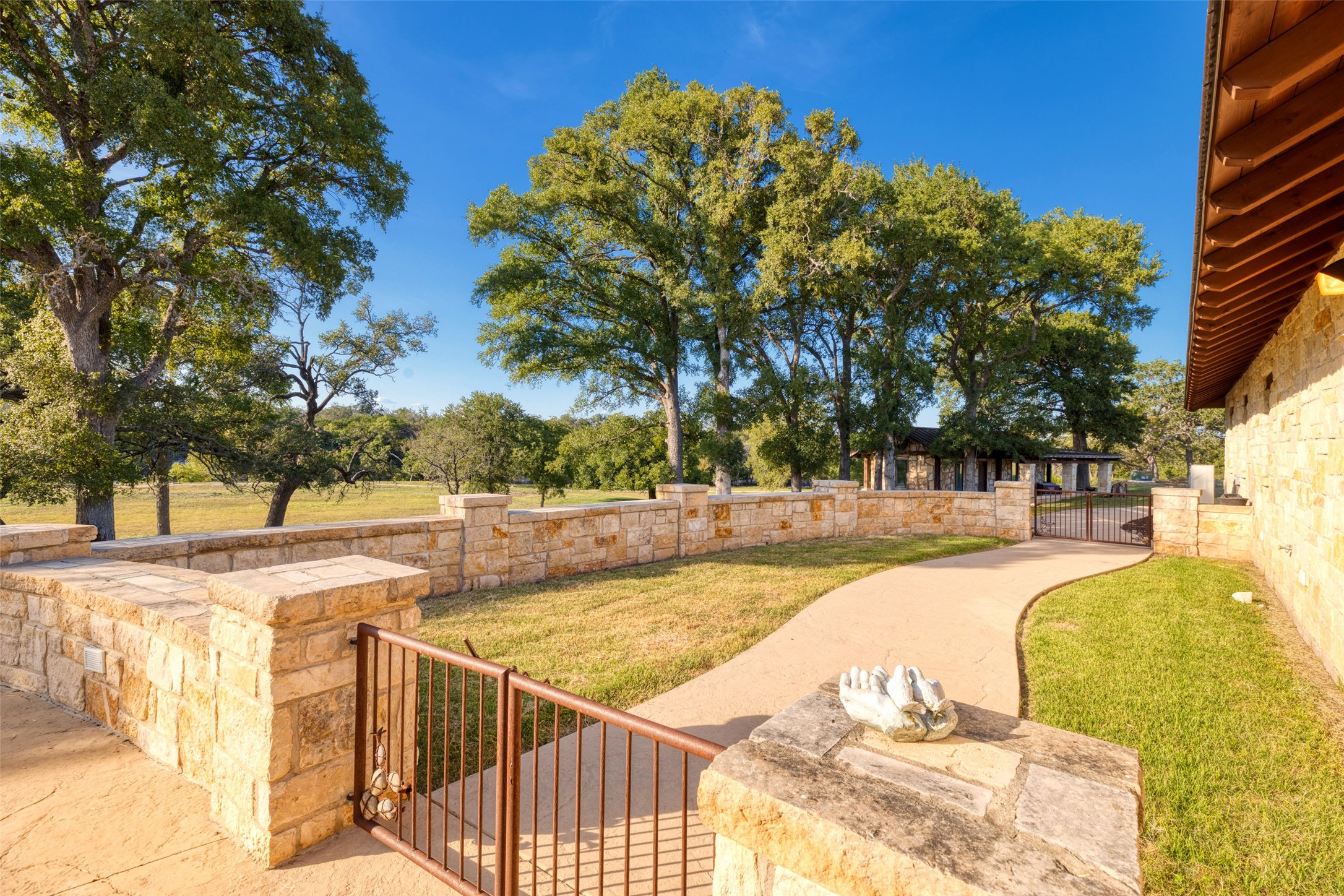 170 Goose Landing, Unit 10 57ACRES Harper, TX 78631 - Photo 30 of 40 a view of swimming pool with large trees