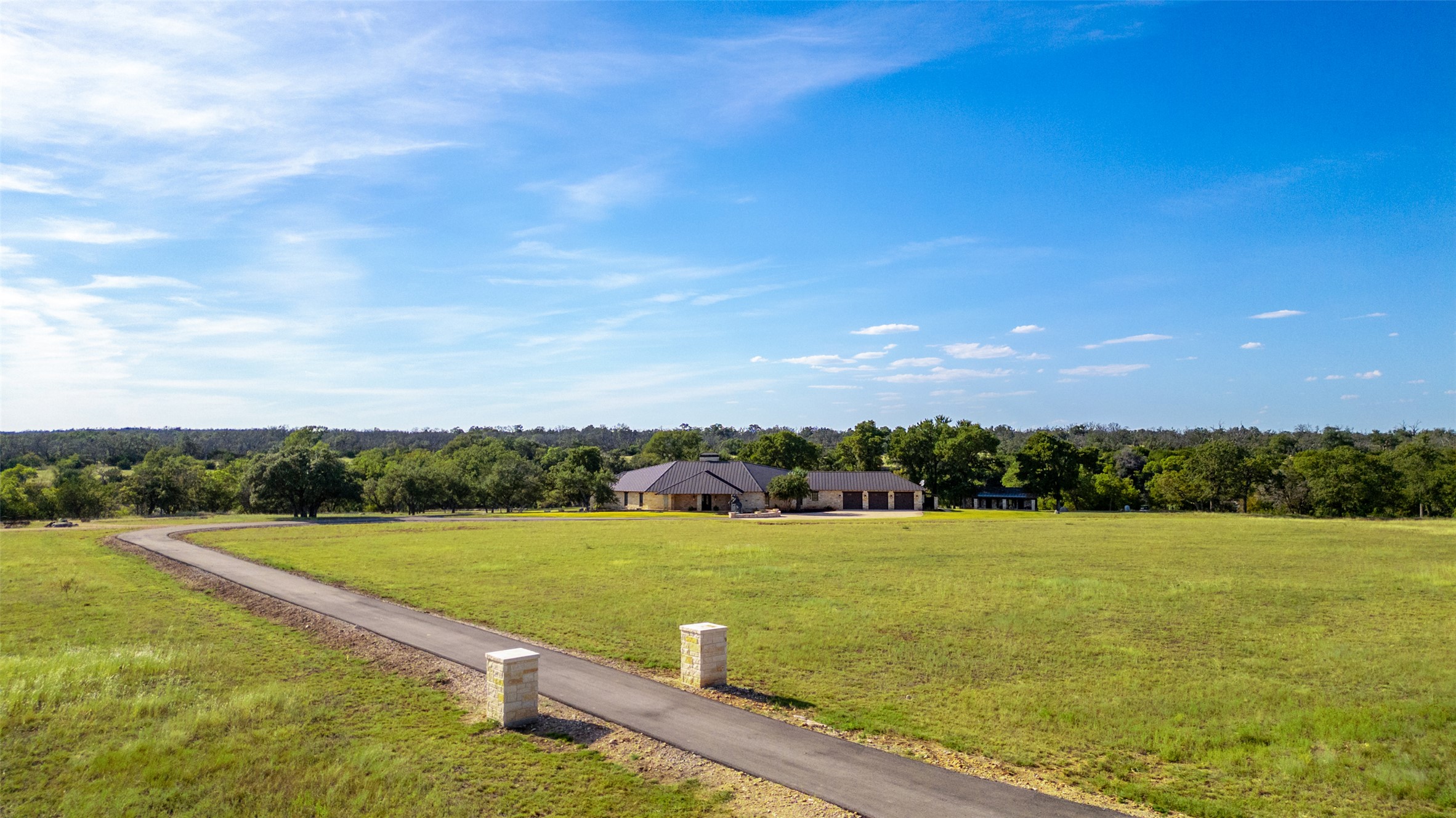 170 Goose Landing, Unit 10 57ACRES Harper, TX 78631 - Photo 7 of 40 a view of a lake with a big yard