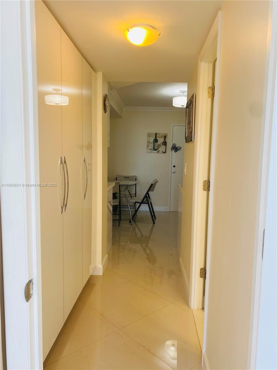 230 174th Street, Unit 507 Sunny Isles Beach, FL 33160 - Photo 12 of 28 a en suite bathroom with a shower